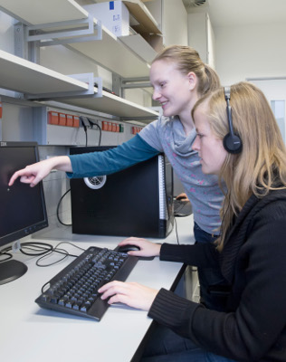 Researcher explaining an experiment to a participant